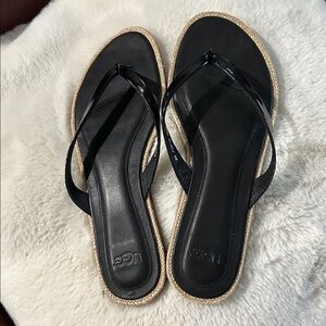 UGG Black leather flip flop. Size 8. Excellent condition.